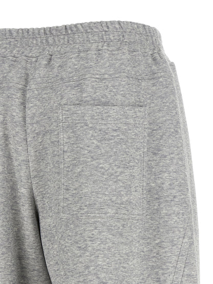 Joggers by Brunello Cucinelli for women in polyamide cotton & cashmere gray features an sophisticated and athletic & wide with a precise long, creating a sophisticated and sophisticated silhouette.