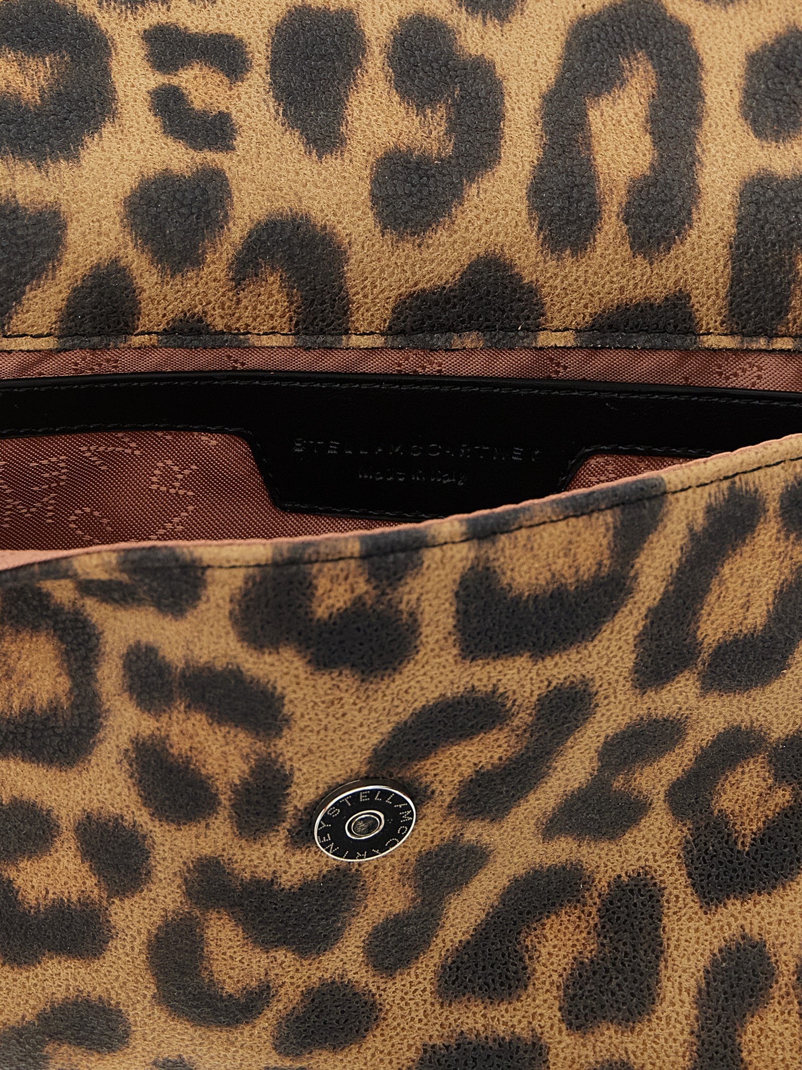 Clutch Handbag by Stella McCartney for women in polyester brown features a architectural silhouette, showcasing a secure magnetic, ample , and versatile for a architectural finish.