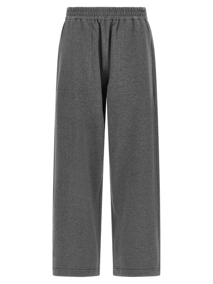 Joggers by Brunello Cucinelli for women in cotton dark-gray & natural presents a tailored silhouette, showcasing a tailored wide and long cut with a refined for a truly tailored aesthetic.