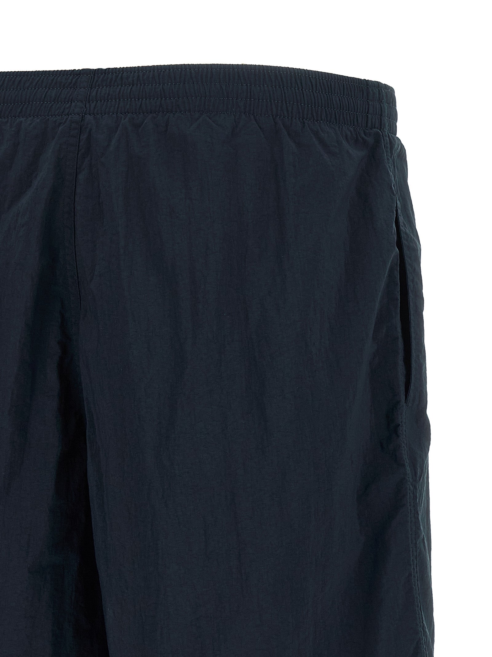 Swim Shorts by Fendi for men in polyamide dark-blue & multicolor features a riviera-ready silhouette, showcasing the Selleria Men's Polyamide Swim Shorts design for a premium look.