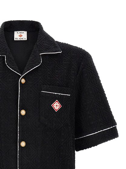 Shirt by Casablanca for men in cotton terry & polyamide black, white, patterned, jacquard & monogram showcases a sleek silhouette, elegantly detailed with a sleek lapel neckline and for a sleek finish.