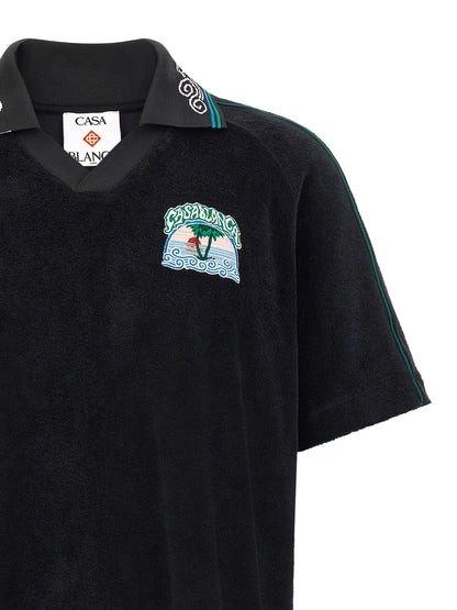 This Polo Shirt by Casablanca for men in cotton terry cloth black, green & white presents a flawless silhouette, showcasing flawless detailing and a refined v-neck neckline for a truly flawless aesthetic.