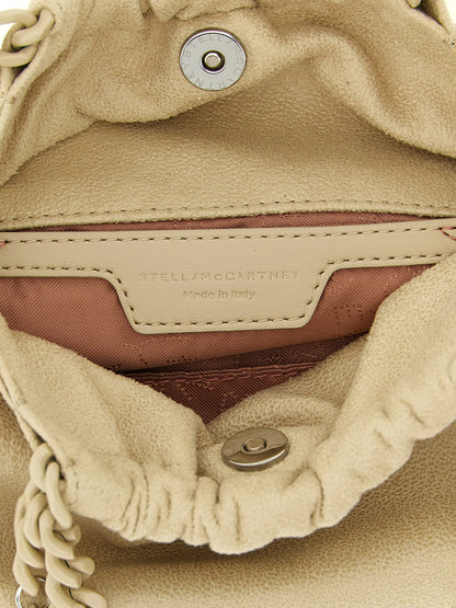 Mini Shoulder Drawstring Bag by Stella McCartney for women in polyester suede leather beige & jacquard presents a versatile silhouette, showcasing a secure drawstring & magnetic and versatile with versatile shoulder-strap for a sophisticated look.