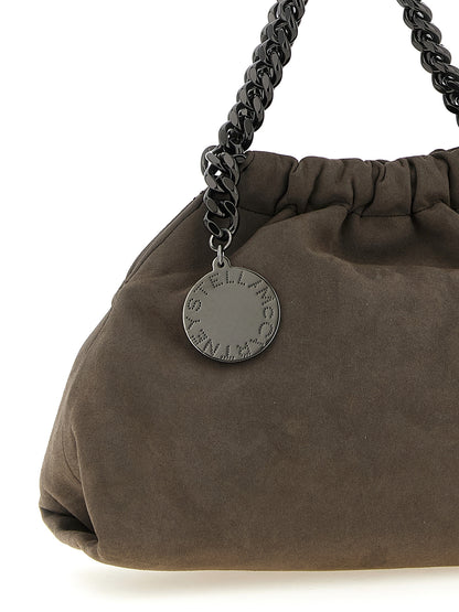 Mini Crossbody Drawstring Handbag by Stella McCartney for women in polyamide suede leather dark-ruthenium, gray, patterned & jacquard features a transformative sophistication silhouette, showcasing a secure drawstring & magnetic, ample , and versatile crossbody-strap & shoulder-strap for a transformative sophistication look.