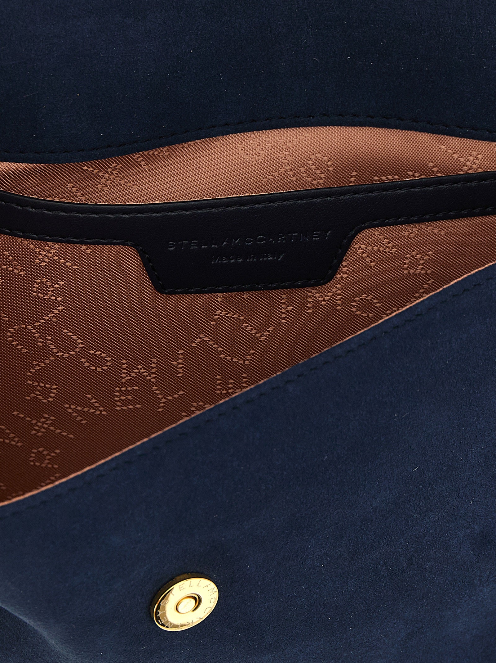 Mini Crossbody Flap Handbag by Stella McCartney for women in polyamide suede leather gold, navy & patterned features a versatile chic silhouette, meticulously detailed with a secure flap & magnetic, ample , and versatile crossbody-strap & shoulder-strap.