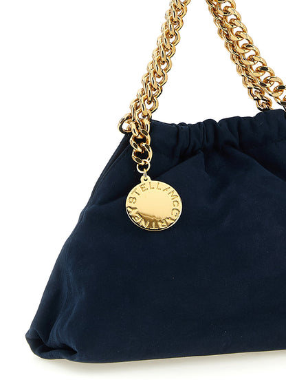 Mini Crossbody Drawstring Handbag by Stella McCartney for women in polyamide suede leather & mesh blue, gold, patterned, signature & monogram features a transformative sophistication silhouette, showcasing a secure drawstring & magnetic, ample , and versatile crossbody-strap, shoulder-strap & handle for a transformative sophistication look.