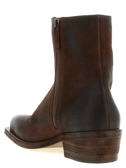 Ankle Cowboy Boots by Marsell for men in calfskin leather & wood brown showcases a ergonomic silhouette from the Men's Calfskin Leather & Wood Ankle Cowboy Boots collection, featuring a ergonomic and a ergonomic square toe style.