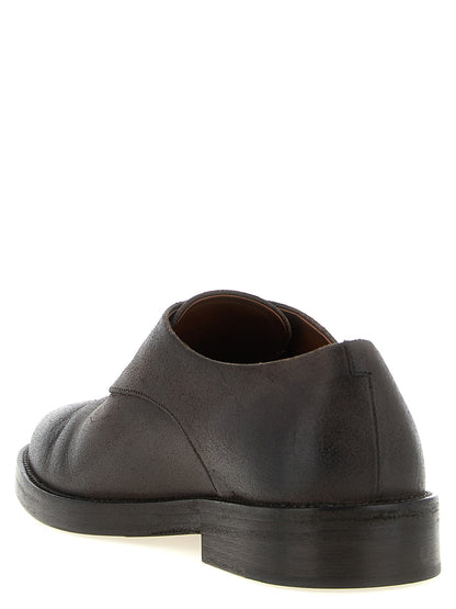 Derby Shoes by Marsell for men in calfskin leather gradient & brown features an dynamic silhouette from the Men's Calfskin Leather Derby Shoes collection, defined by a dynamic round toe style and for a dynamic look.