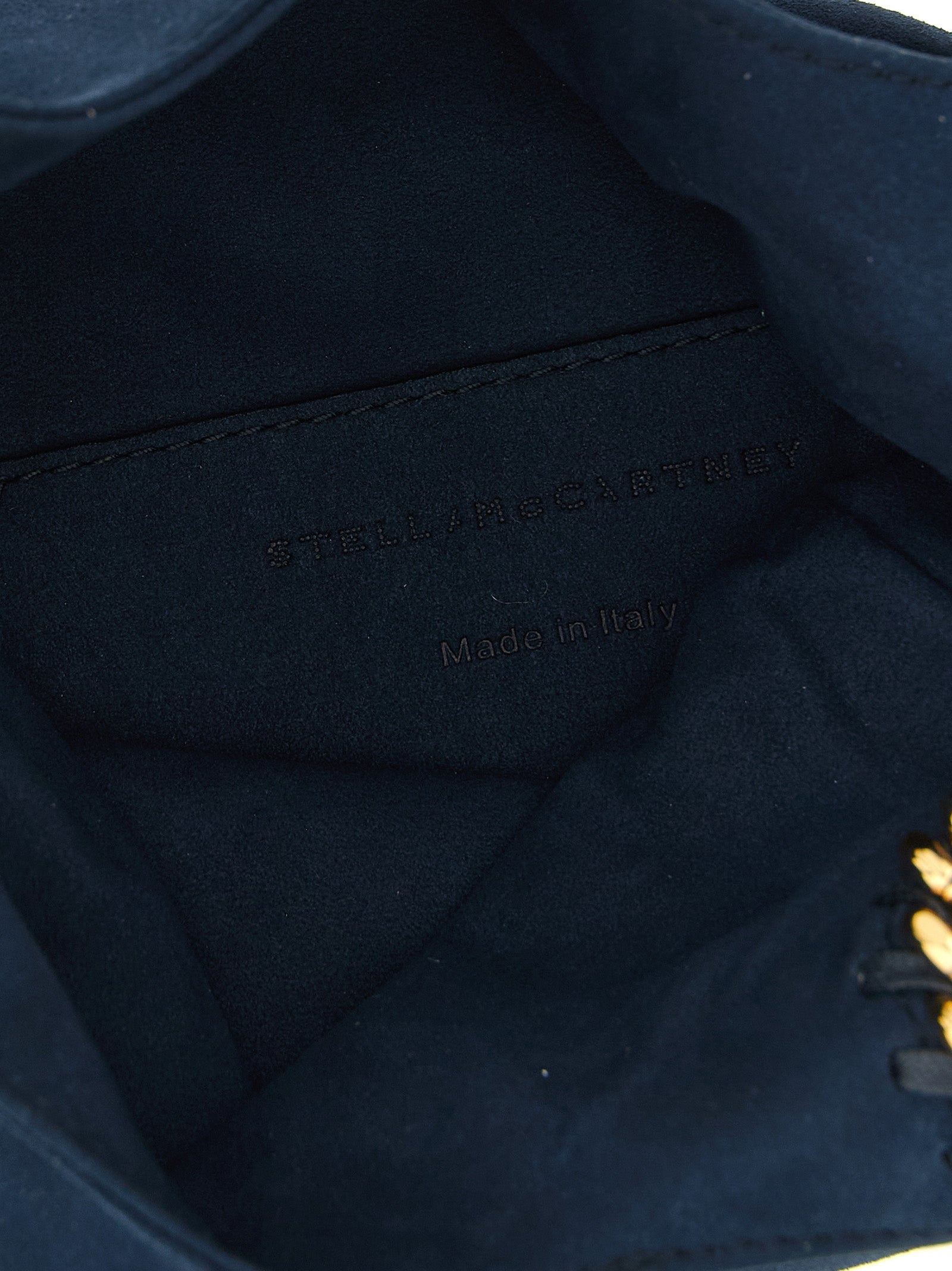 Pouch Handbag by Stella McCartney for women in polyamide suede leather gold & navy features a refined silhouette, showcasing a secure , organized , and versatile wristlet & handle for a refined finish.