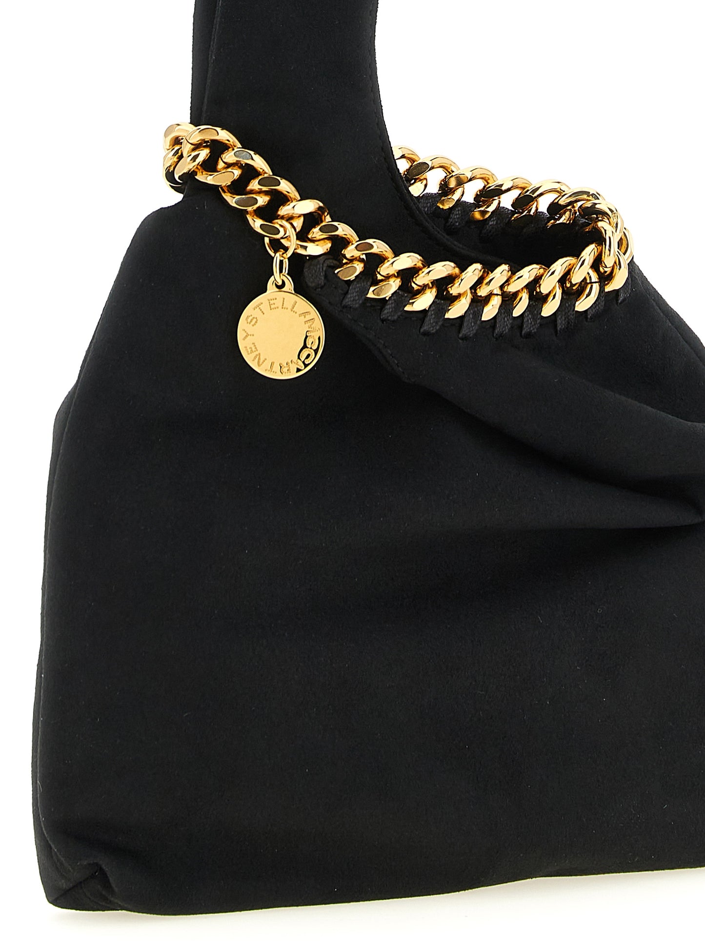 Evening Tote Handbag by Stella McCartney for women in polyamide suede leather black & gold features a exquisite silhouette, showcasing a secure and exquisite with versatile wristlet for a exquisite finish.