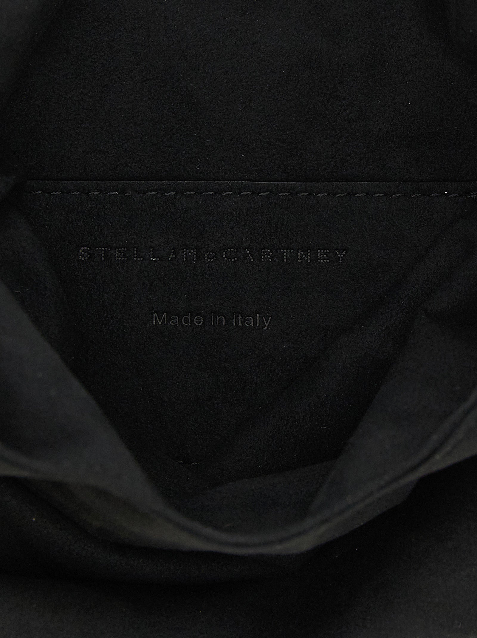 Evening Tote Handbag by Stella McCartney for women in polyamide suede leather black & gold features a signature silhouette, showcasing a secure and signature with versatile wristlet for a sophisticated look.