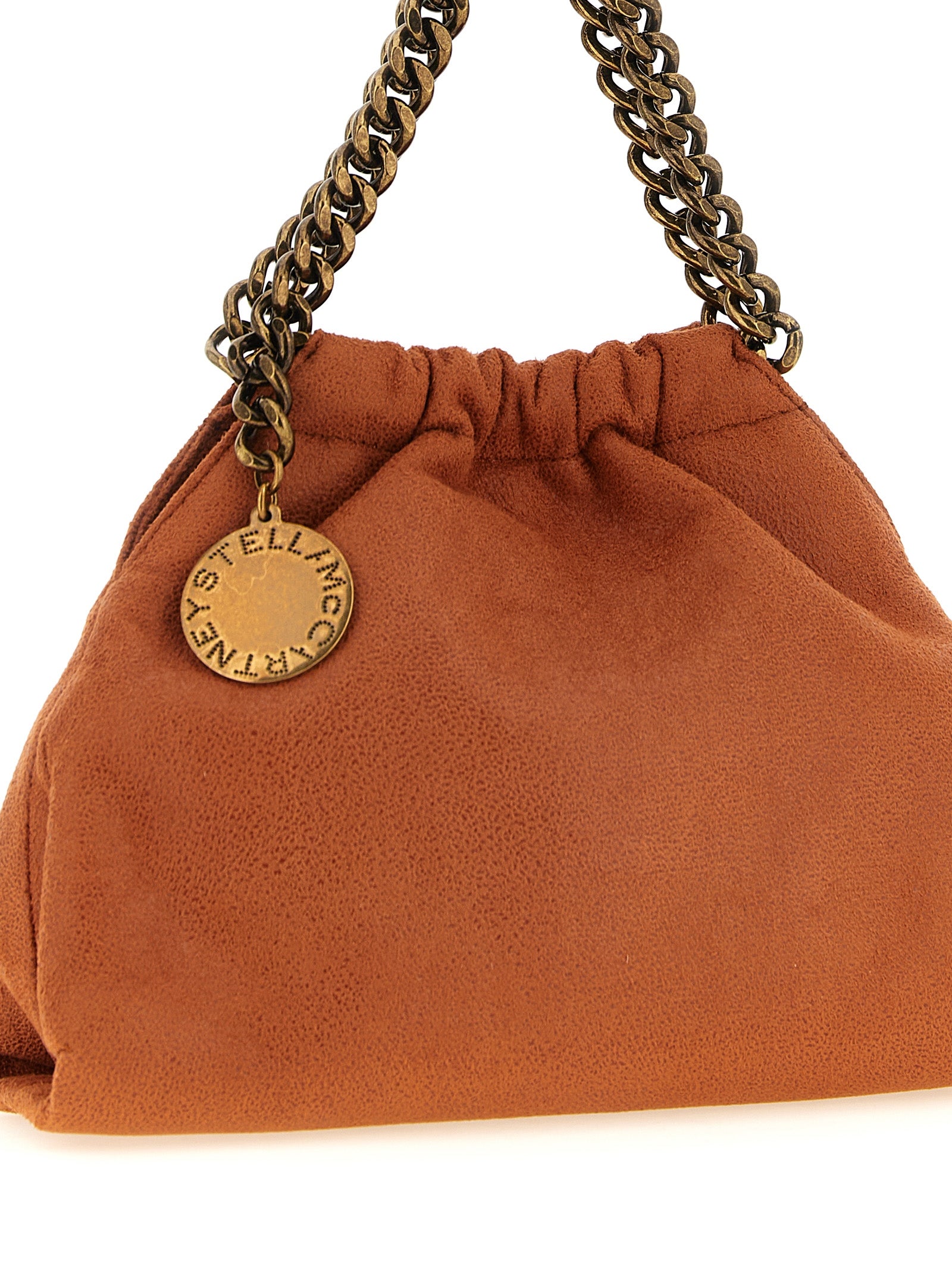 Mini Drawstring Shoulder Bag by Stella McCartney for women in polyester suede leather gold, orange, patterned & jacquard features a effortless chic silhouette with a secure drawstring & magnetic, ample , and versatile shoulder-strap & handle for a effortless chic finish.