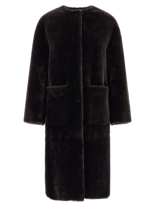 Overcoat by BLANCHA for women in fur brown showcases a enveloping silhouette, detailed with distinctive pockets and a enveloping round neckline.