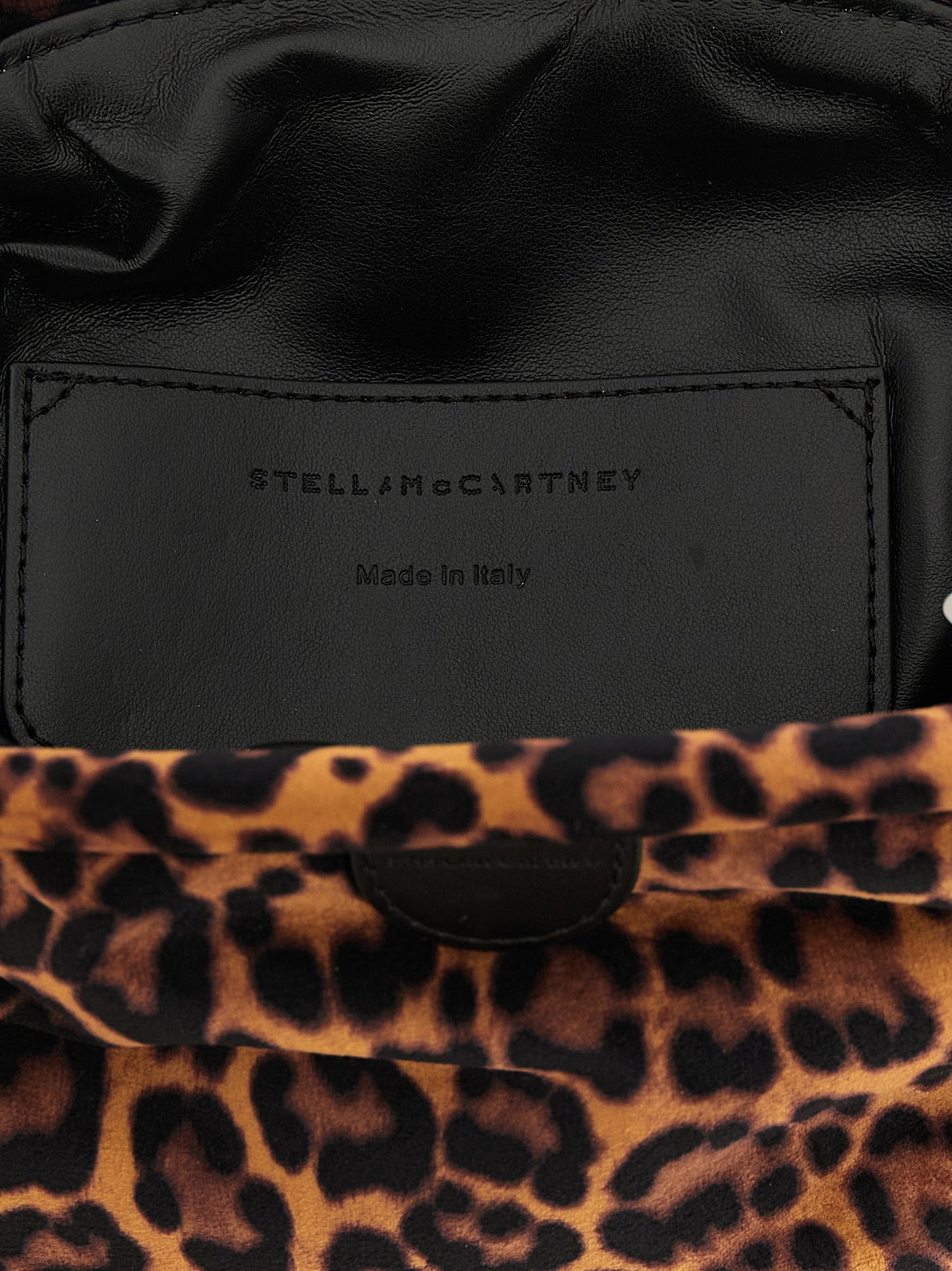 Clutch Handbag by Stella McCartney for women in polyester velvet black, multicolor, silver, leopard-print & print features a sculptural silhouette with a secure , ample , and versatile shoulder-strap for a sculptural finish.