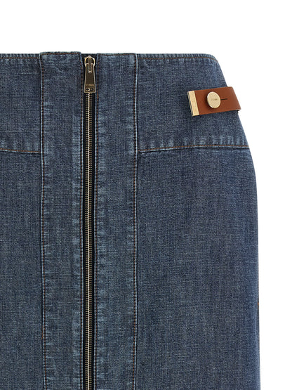 Skirt by Fendi for women in denim cotton gold, navy & signature showcases a sultry silhouette, elegantly defined by its midi and the sophisticated sultry design of the Women's Denim Straight Cotton Skirt.