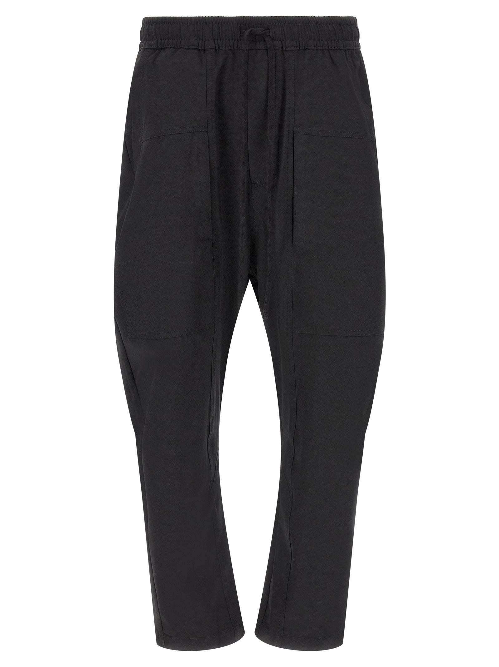 Trousers by Thom Krom for men in polyamide black presents a smart silhouette, meticulously detailed with a smart athletic & relaxed-fit, a smart long, and a smart .