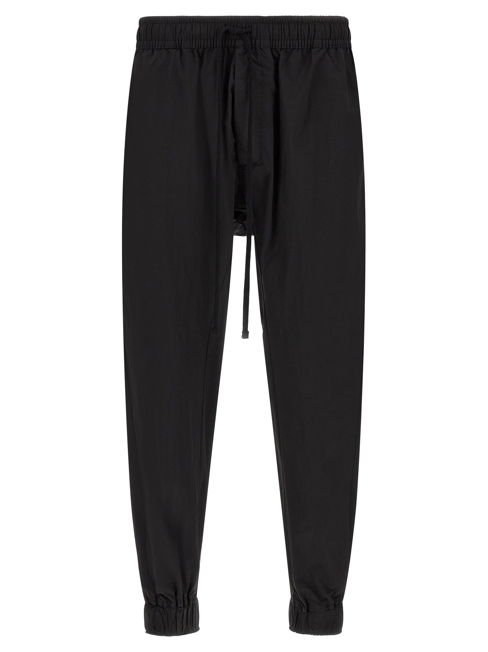 Trousers by Thom Krom for men in horse leather & polyamide black features an sartorial silhouette, showcasing a precise relaxed-fit and long with a sartorial for a refined look.