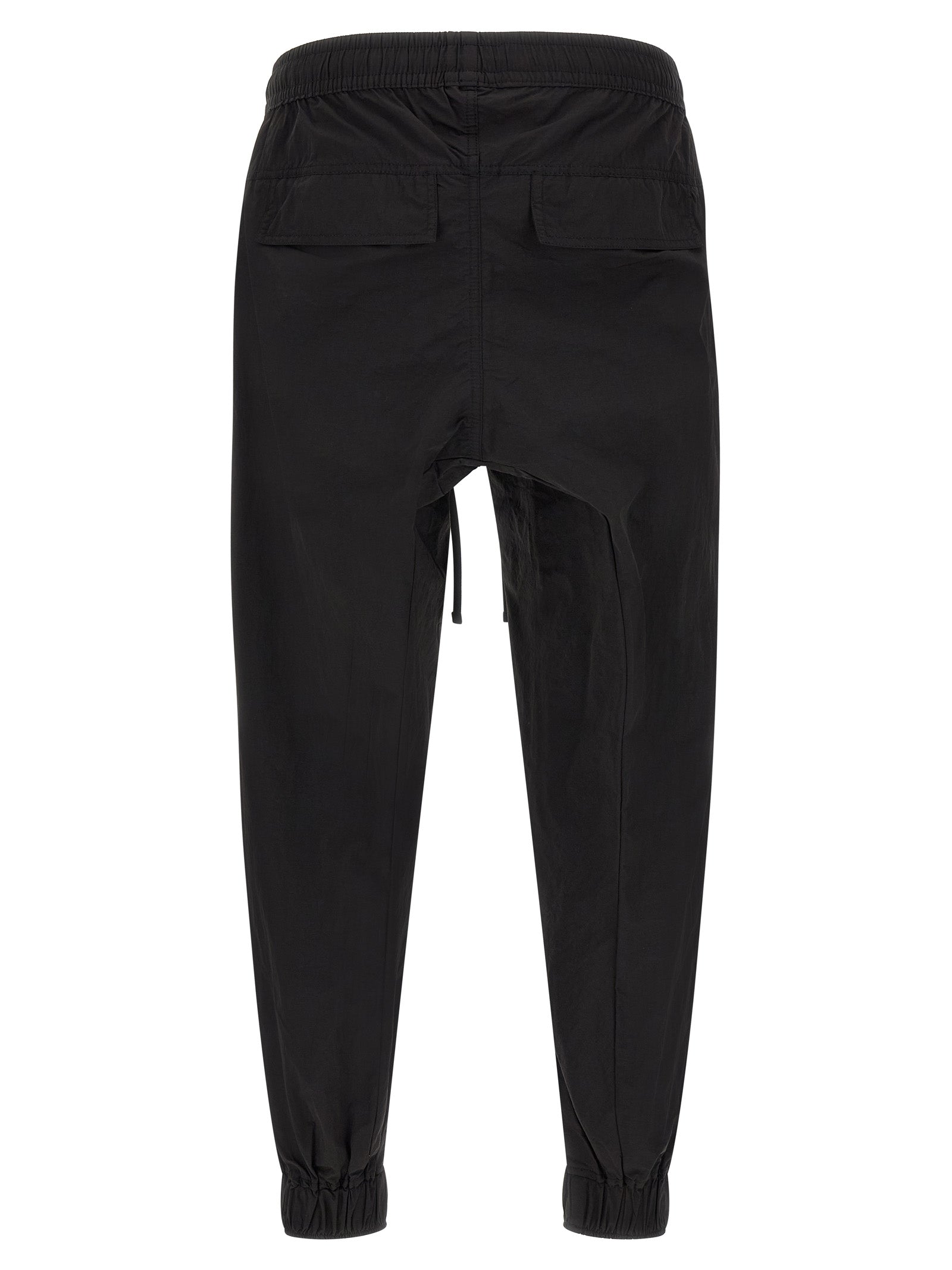 Trousers by Thom Krom for men in horse leather & polyamide black features a artisanal silhouette, showcasing a sophisticated relaxed-fit with a long and for a artisanal finish.