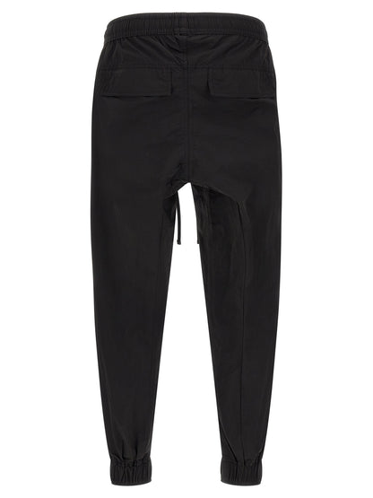 Trousers by Thom Krom for men in horse leather & polyamide black features a artisanal silhouette, showcasing a sophisticated relaxed-fit with a long and for a artisanal finish.