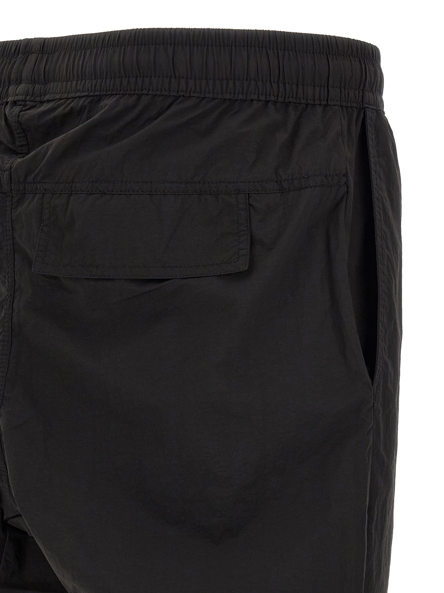 Trousers by Thom Krom for men in horse leather & polyamide black features an on trend silhouette, showcasing a sophisticated relaxed-fit with a long and for an on trend finish.