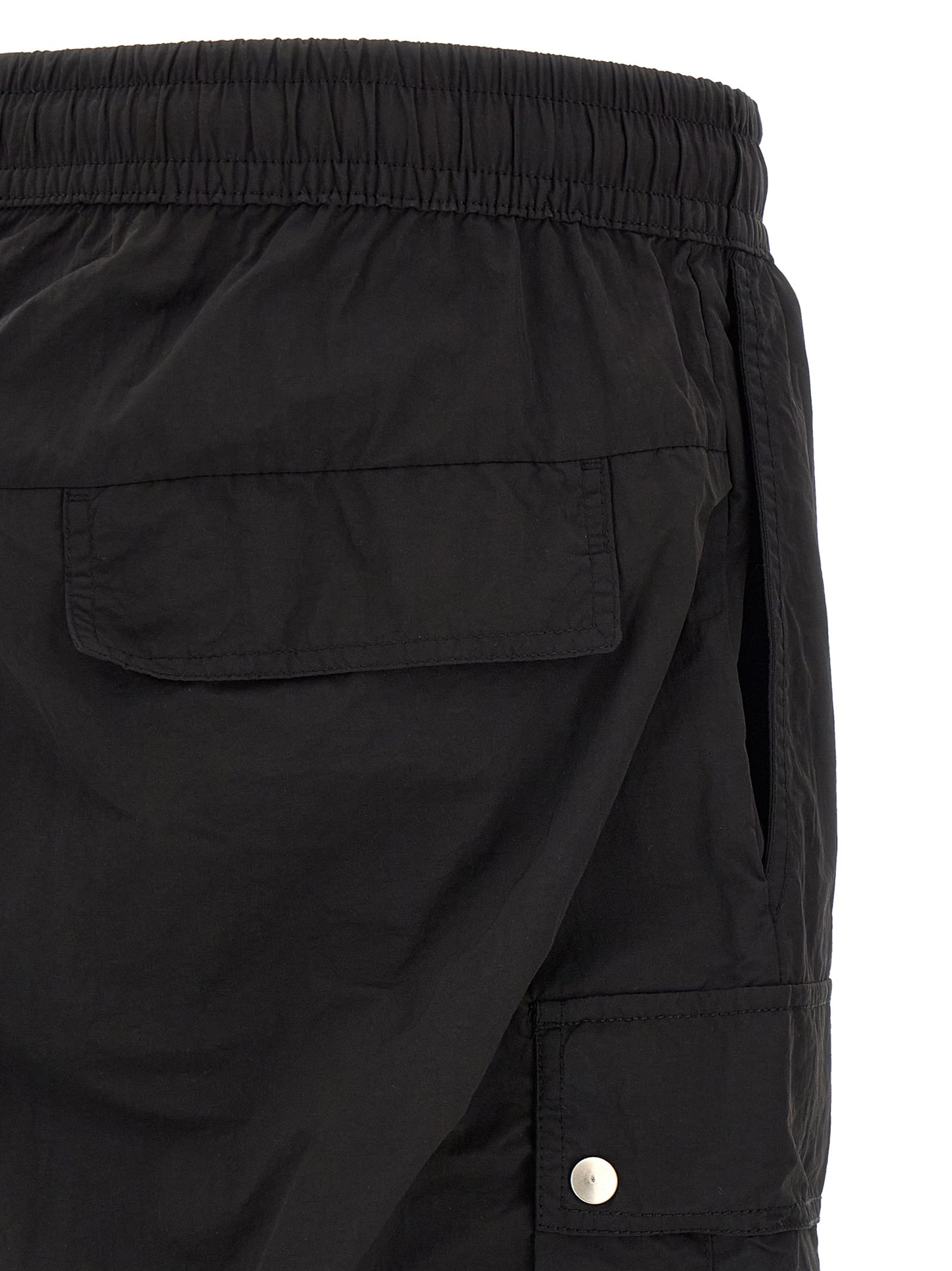 Cargo Pants by Thom Krom for men in polyamide black & silver features an smart casual tapered-leg & relaxed-fit and long, expertly tailored with a and smart casual utilitarian details for a sophisticated look.
