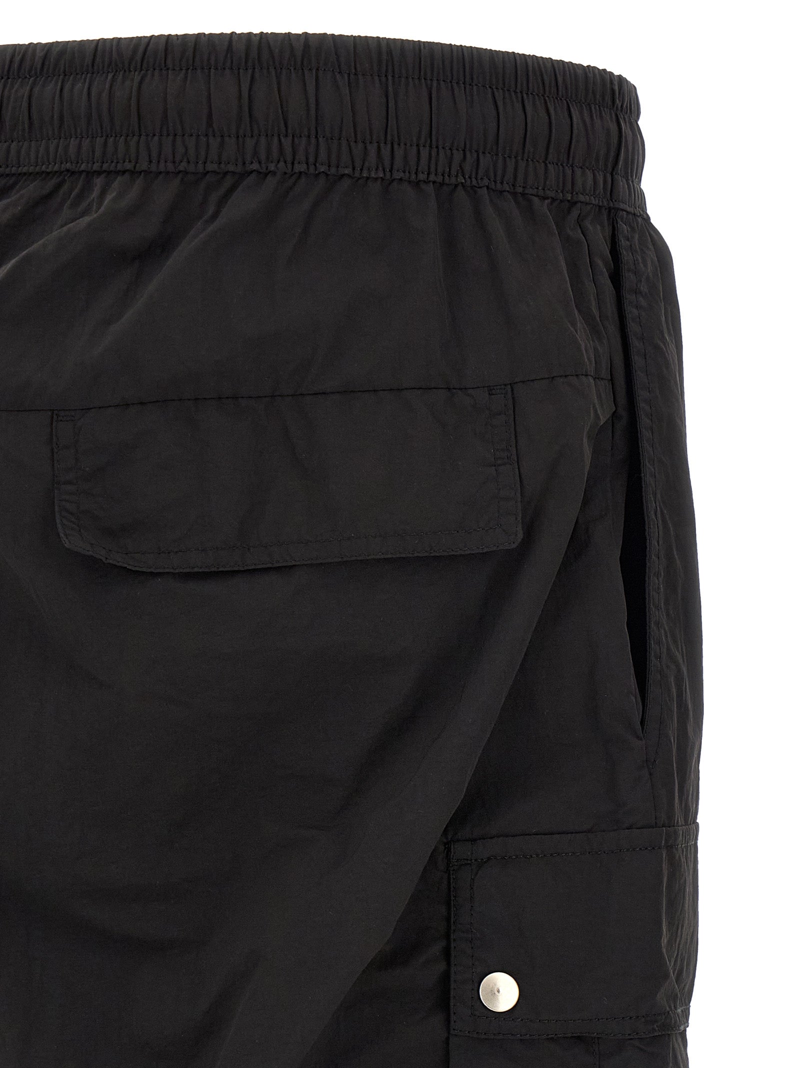 Cargo Pants by Thom Krom for men in polyamide black & silver features an smart casual tapered-leg & relaxed-fit and long, expertly tailored with a and smart casual utilitarian details for a sophisticated look.
