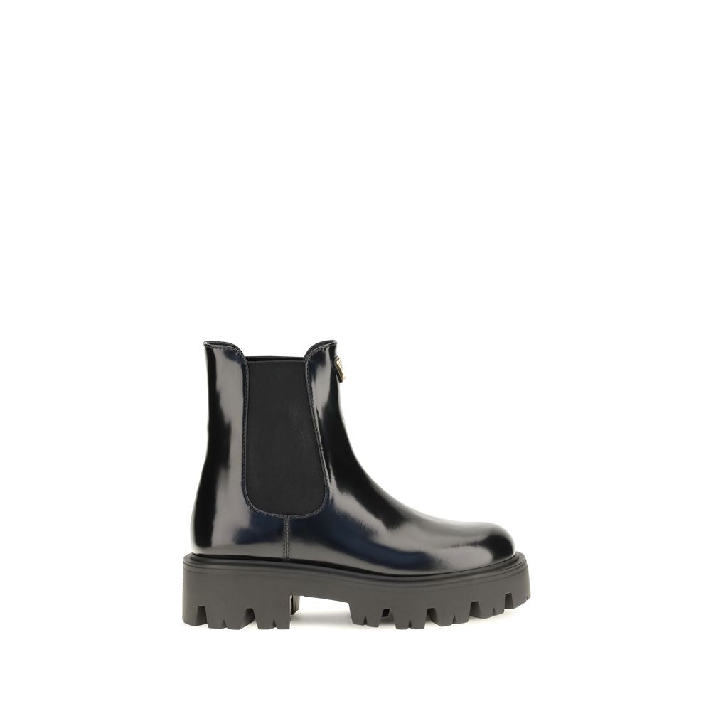 Ankle Chelsea Boots by Prada for women in bos taurus calf leather black features an effortless chic silhouette from the Women's Bos Taurus Calf Leather Ankle Chelsea Boots collection, showcasing a effortless chic and refined for an effortless chic look.
