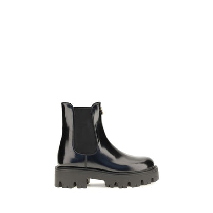 Ankle Chelsea Boots by Prada for women in bos taurus calf leather black features an effortless chic silhouette from the Women's Bos Taurus Calf Leather Ankle Chelsea Boots collection, showcasing a effortless chic and refined for an effortless chic look.