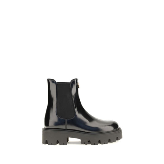 Ankle Chelsea Boots by Prada for women in bos taurus calf leather black features an effortless chic silhouette from the Women's Bos Taurus Calf Leather Ankle Chelsea Boots collection, showcasing a effortless chic and refined for an effortless chic look.