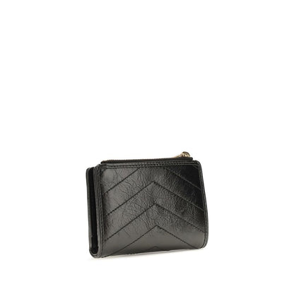 Cardholder Wallet by Saint Laurent for women in bos taurus calfskin leather black, bronze, chevron & signature showcases a enchanting silhouette, artfully detailed with the signature style of the Cassandre Niki Bos Taurus Calfskin Leather Cardholder Wallet and functional card-organization bifold.