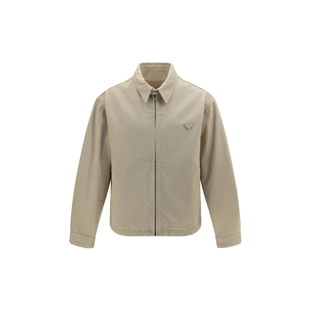 Trucker Jacket by Prada for men in denim cotton beige features a city-ready silhouette, detailed with pockets and a city-ready .