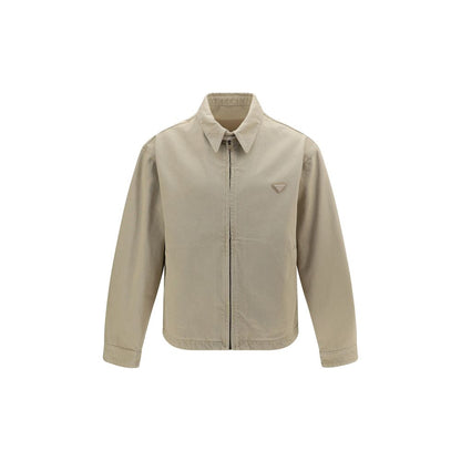 Trucker Jacket by Prada for men in denim cotton beige features a city-ready silhouette, detailed with pockets and a city-ready .
