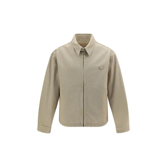 Trucker Jacket by Prada for men in denim cotton beige features a city-ready silhouette, detailed with pockets and a city-ready .