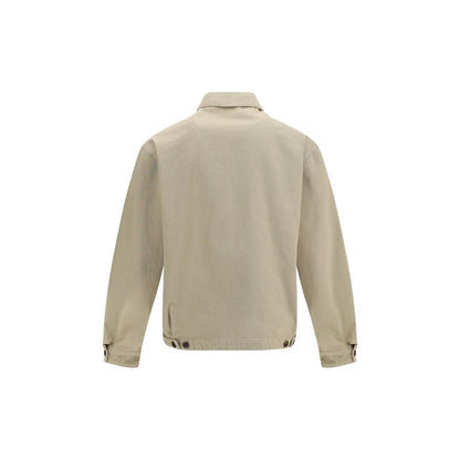 This Trucker Jacket by Prada for men in denim cotton beige exhibits a edgy silhouette, meticulously detailed with functional pockets and a edgy for a edgy finish.