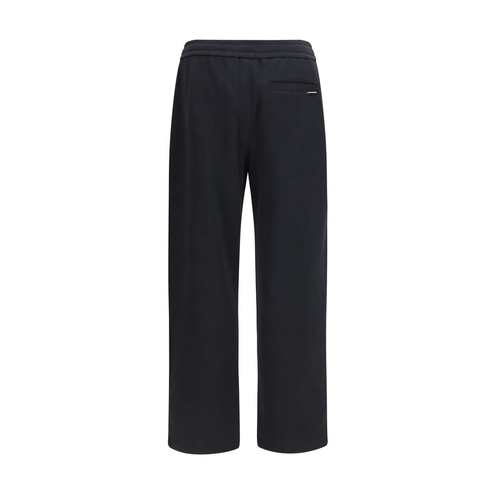 Trousers by Moose Knuckles for men in cotton black features a sculptural silhouette, showcasing a sculptural straight-leg & regular-fit and long with a sophisticated for a sculptural finish.