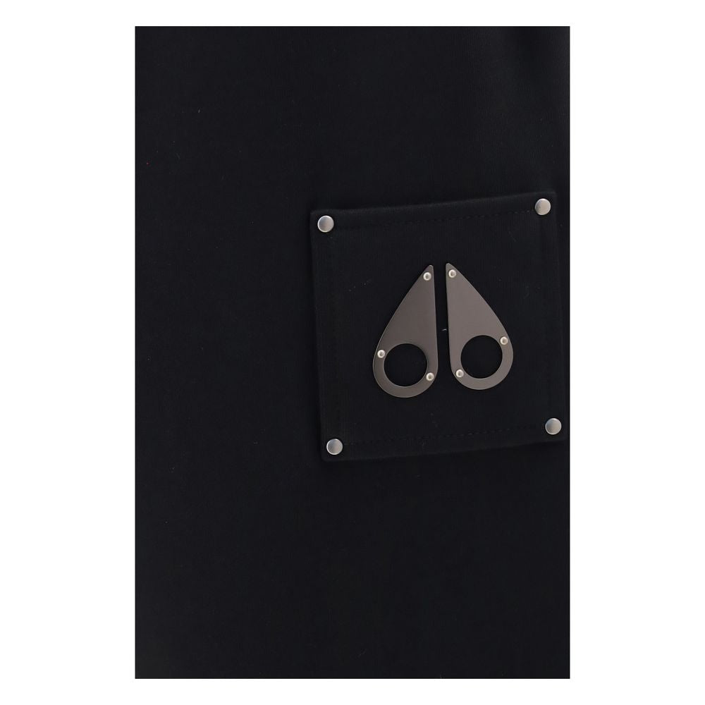 Trousers by Moose Knuckles for men in cotton black presents a perennial silhouette, meticulously tailored with a straight-leg & regular-fit cut, long finish, and an elegant .