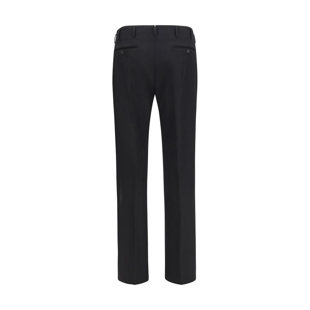 Trousers by Prada for men in wool black features a tailored silhouette with a tailored regular-fit & wide, defined by its long and a sophisticated high rise.