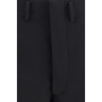 Trousers by Prada for men in wool black presents a smart silhouette, meticulously detailed with a smart regular-fit & wide, a smart long, and a smart high rise.