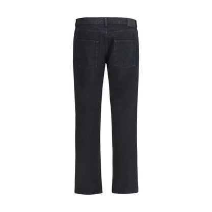 Jeans by Saint Laurent for men in denim cotton black presents a tailored silhouette, showcasing a tailored regular-fit & slim and long cut with a refined for a truly tailored aesthetic.