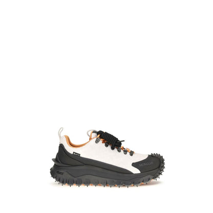 Athletic Sneakers Moncler men eva tu & bos taurus suede calf leather multicolor featuring a avant-garde Men's Athletic EVA TU & Bos Taurus Suede Calf Leather Sneakers design with a avant-garde athletic style for a refined finish.