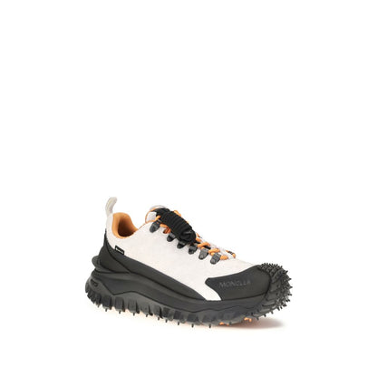 Athletic Sneakers by Moncler for men in eva tu & bos taurus suede calf leather multicolor features an effortless chic silhouette, showcasing the signature athletic style of the Men's Athletic EVA TU & Bos Taurus Suede Calf Leather Sneakers collection with a truly effortless chic finish.