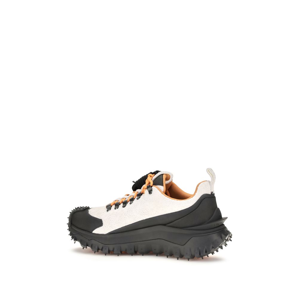 Athletic Sneakers by Moncler for men in eva tu & bos taurus suede calf leather multicolor showcases a architectural silhouette, artfully capturing the essence of the Men's Athletic EVA TU & Bos Taurus Suede Calf Leather Sneakers with its signature architectural athletic style construction.