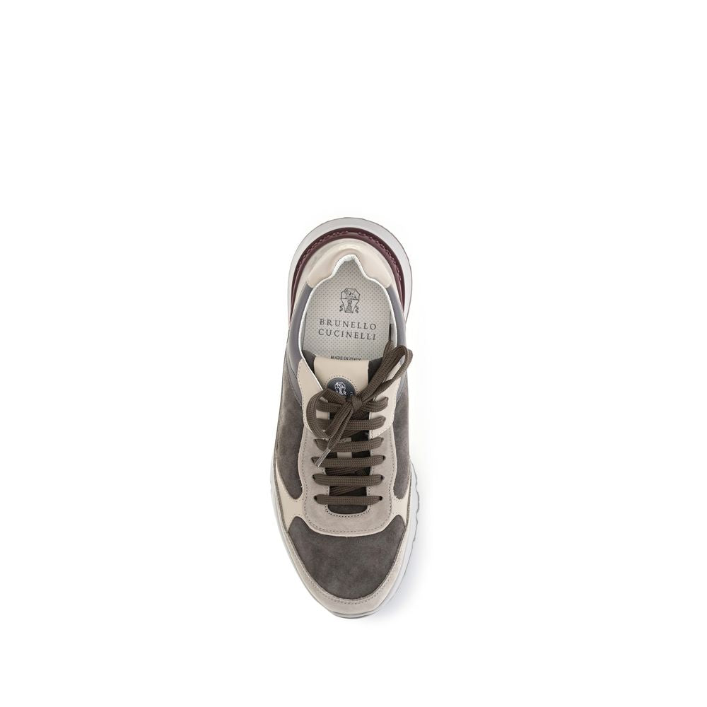Sneakers by Brunello Cucinelli for men in tu & bos taurus calf leather gray presents a sumptuous silhouette, artfully capturing the essence of the Men's Chunky TU & Bos Taurus Calf Leather Sneakers with its sumptuous chunky style design.