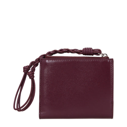 Wallet by Jil Sander for women in leather red showcases a enchanting silhouette, artfully detailed with the signature style of the Leather Wallet and functional .