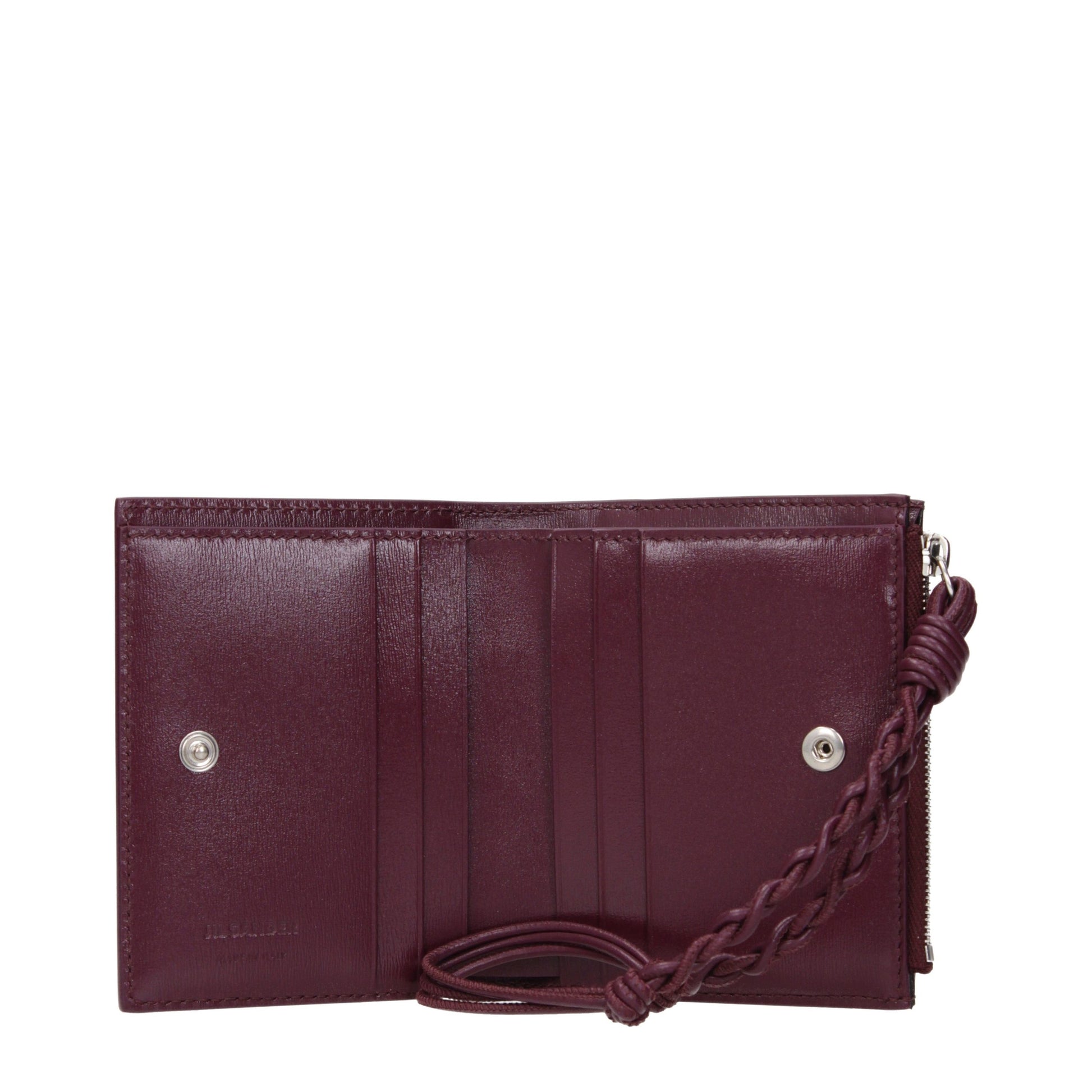 Wallet by Jil Sander for women in leather red showcases a discerning silhouette, artfully capturing the essence of Leather Wallet with its functional .