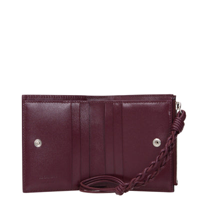 Wallet by Jil Sander for women in leather red showcases a discerning silhouette, artfully capturing the essence of Leather Wallet with its functional .