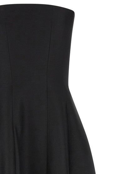 Dress by Khaite for women in wool & silk black features an cute silhouette, detailed with a and that elegantly flows into a cute long.