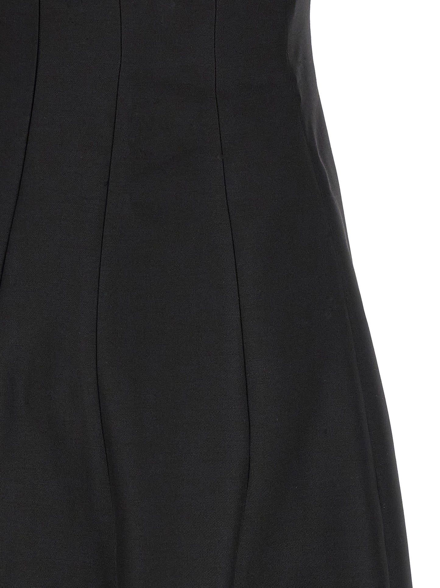 Dress by Khaite for women in wool & silk black features an sultry silhouette defined by a and , falling to an sultry long for a sultry look.