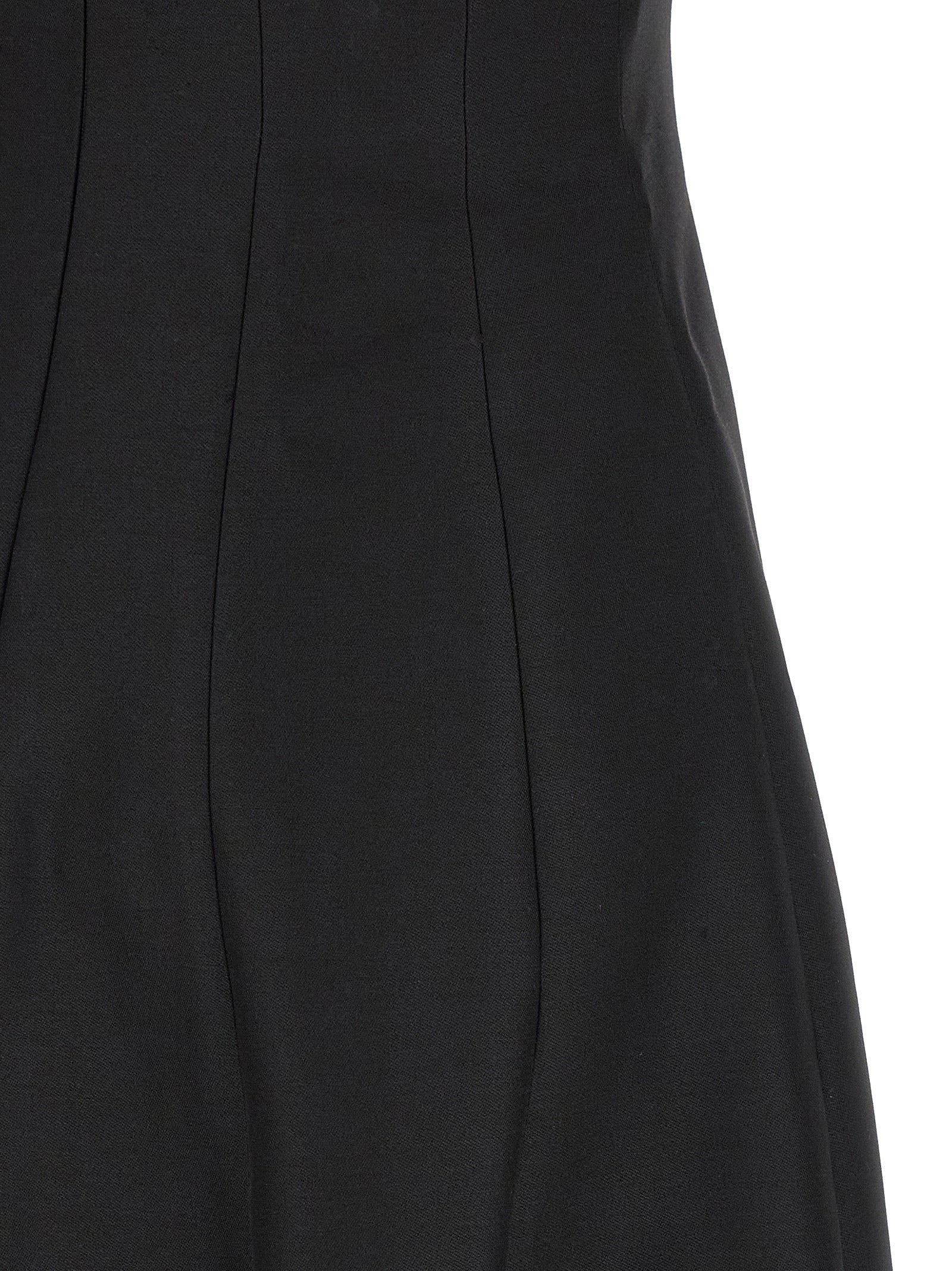Dress by Khaite for women in wool & silk black features an sultry silhouette defined by a and , falling to an sultry long for a sultry look.