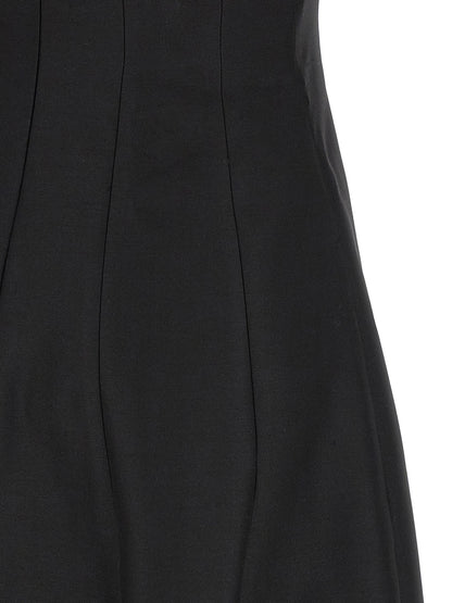 Dress by Khaite for women in wool & silk black features an sultry silhouette defined by a and , falling to an sultry long for a sultry look.